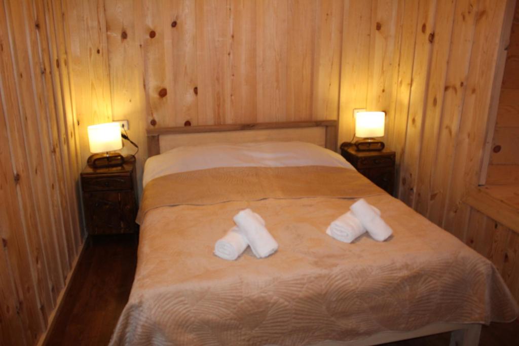 Postel nebo postele na pokoji v ubytování Ecohouse Svaneti
