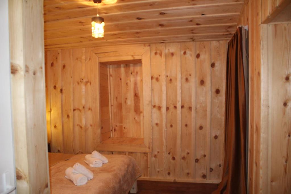Postel nebo postele na pokoji v ubytování Ecohouse Svaneti
