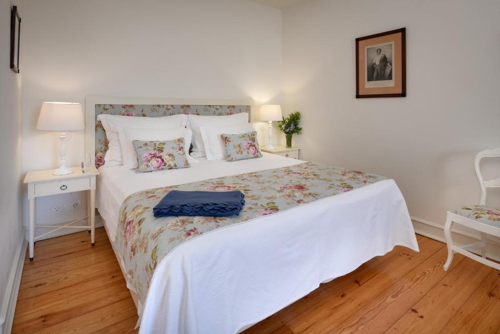 Кровать или кровати в номере Hotel Casa Palmela - Small Luxury Hotels of The World, Hotel & Villas