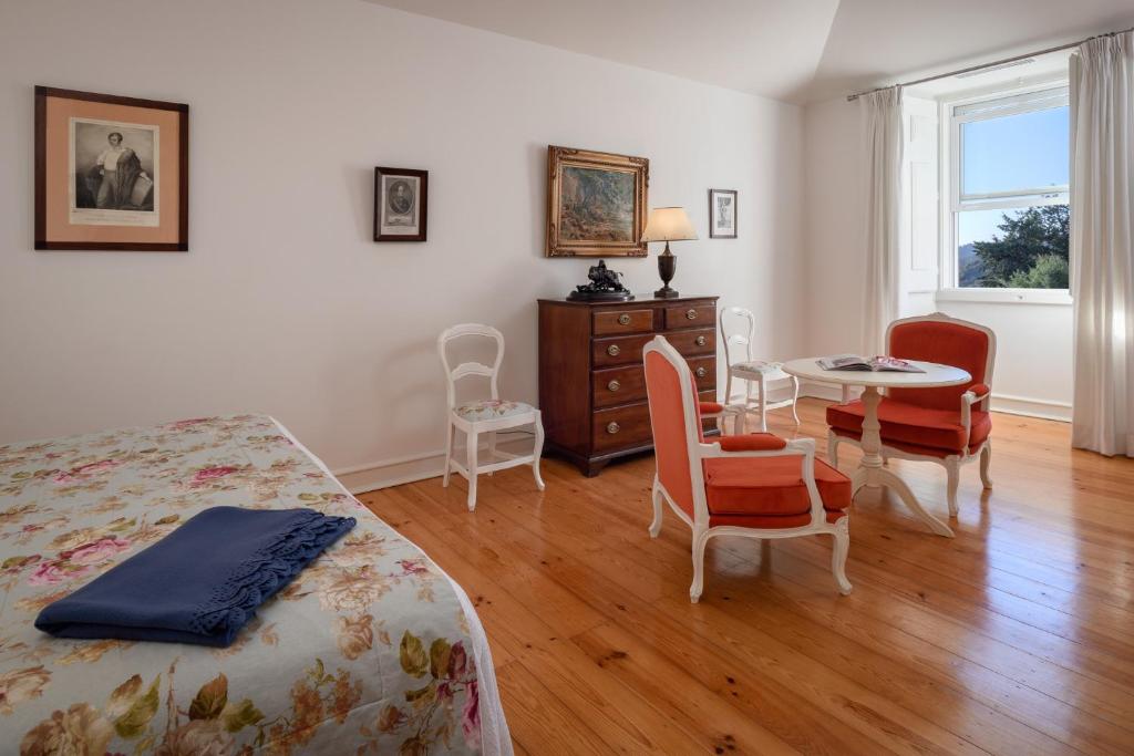 Кровать или кровати в номере Hotel Casa Palmela - Small Luxury Hotels of The World, Hotel & Villas