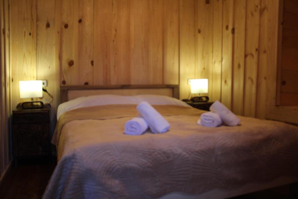 Postel nebo postele na pokoji v ubytování Ecohouse Svaneti