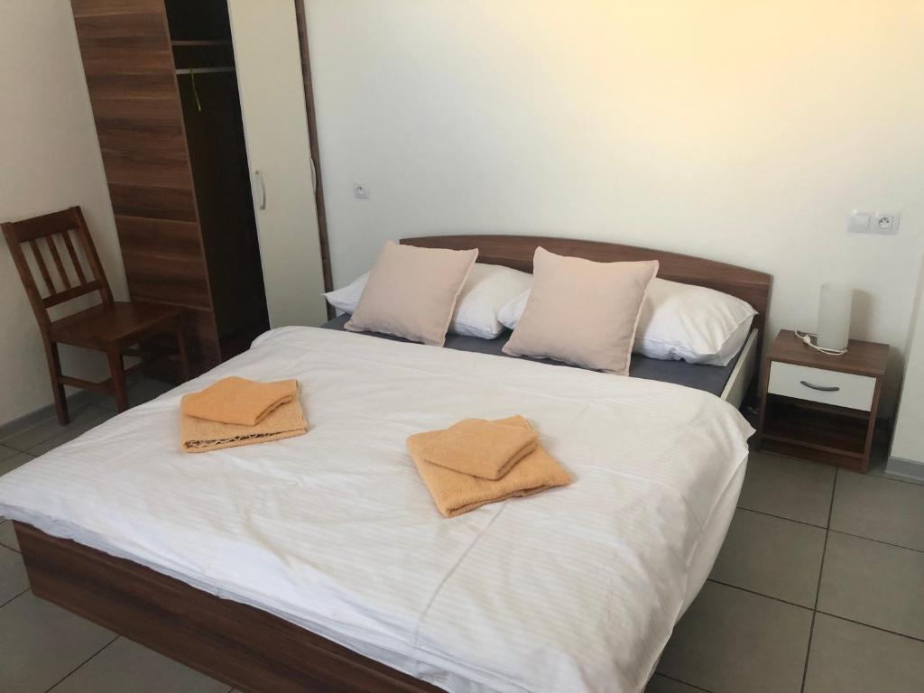 Postel nebo postele na pokoji v ubytování Alegria Natur Apartments