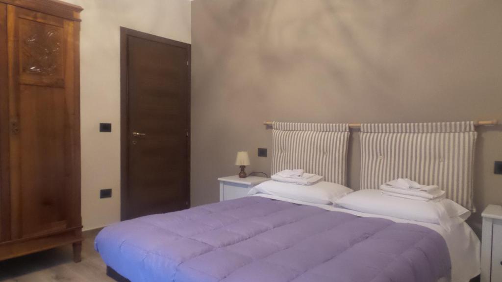 Postel nebo postele na pokoji v ubytování Casa Furore
