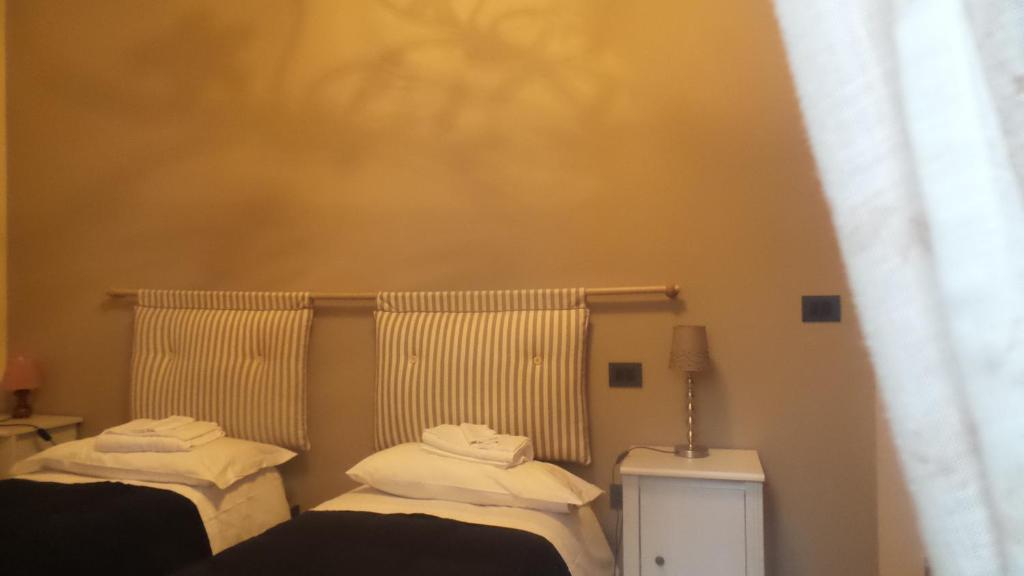 Postel nebo postele na pokoji v ubytování Casa Furore