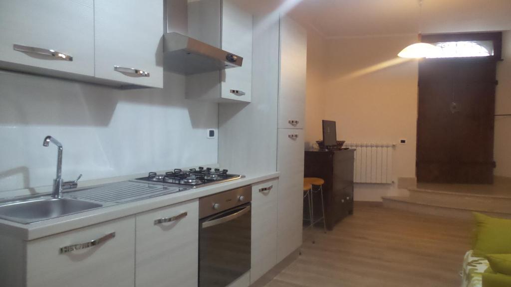 Kuchyň nebo kuchyňský kout v ubytování Casa Furore
