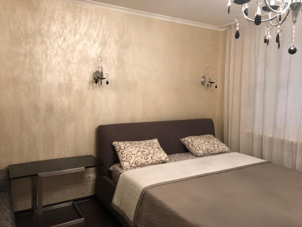 Katil atau katil-katil dalam bilik di Апартаменты Александра Поля 59