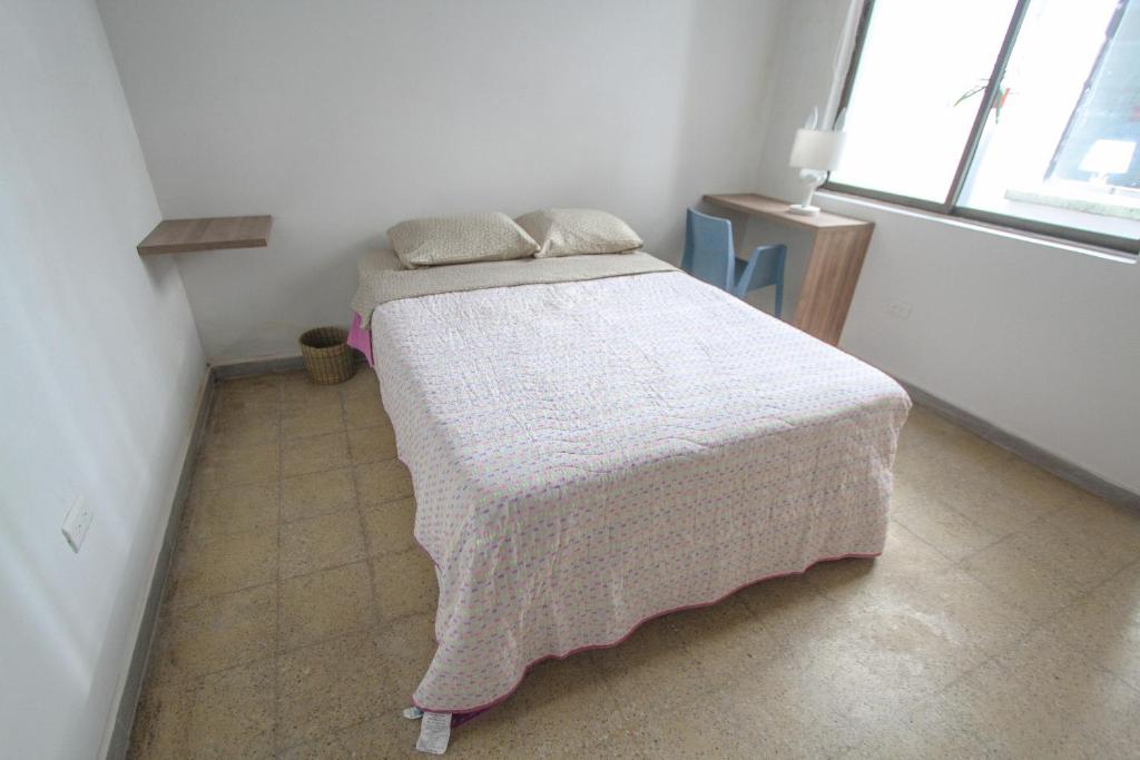Postel nebo postele na pokoji v ubytování Casa Tuvia