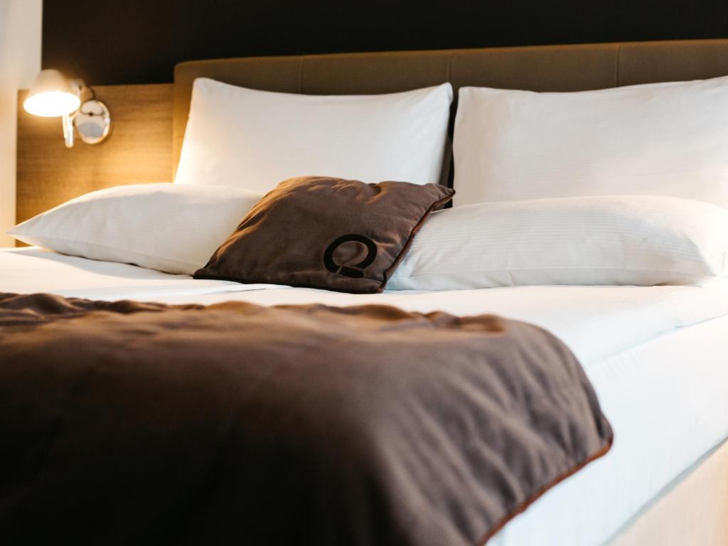 Posteľ alebo postele v izbe v ubytovaní Q Hotel Plus Kraków
