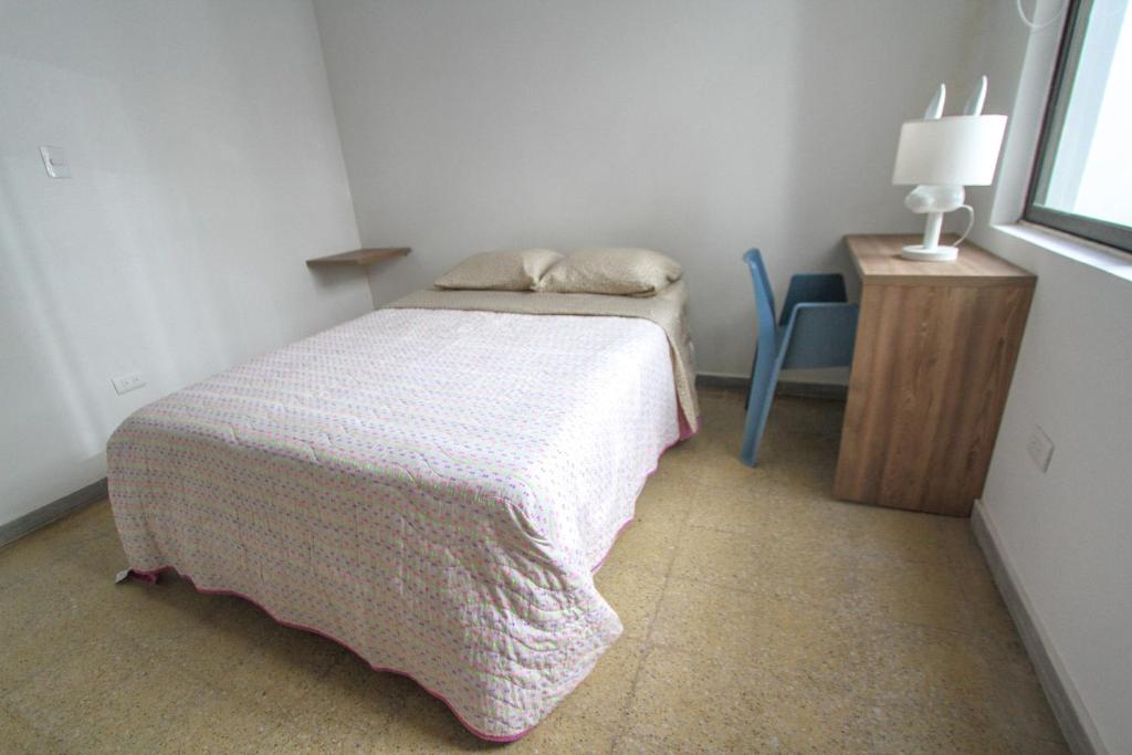 Postel nebo postele na pokoji v ubytování Casa Tuvia