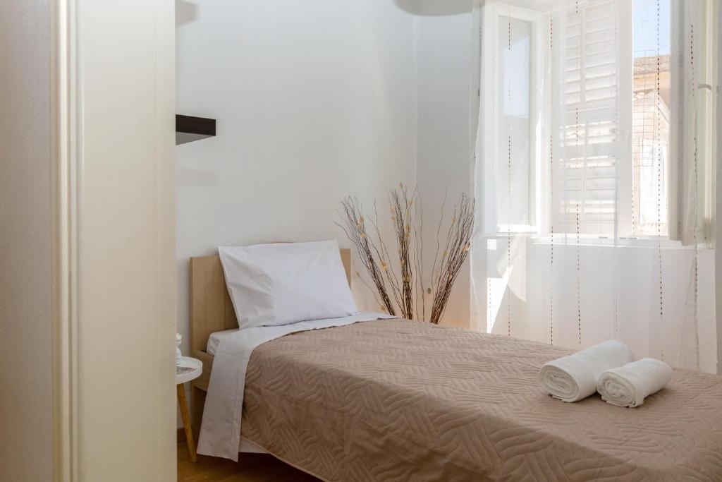 Posteľ alebo postele v izbe v ubytovaní Yasmin House by CorfuEscapes