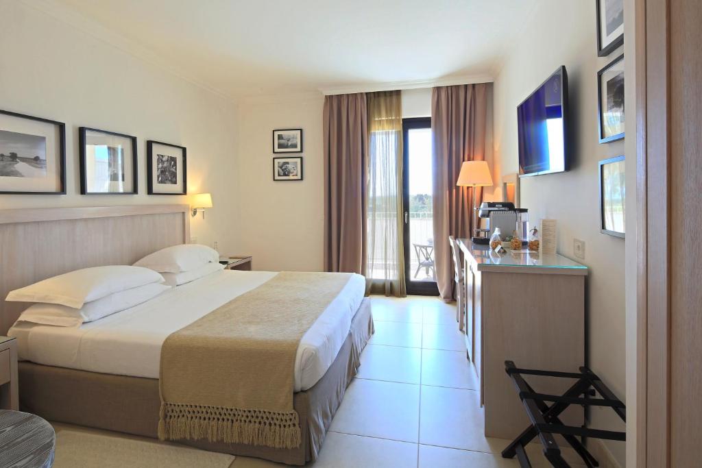 Canne Bianche Lifestyle Hotelにあるベッド