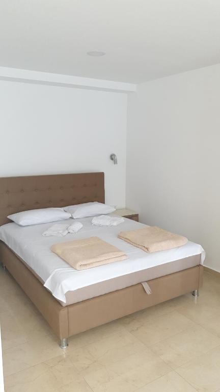 Postel nebo postele na pokoji v ubytování Tondo