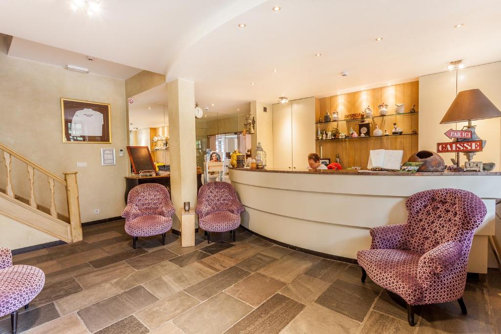 Posezení v ubytování Hotel Fief De Liboichant