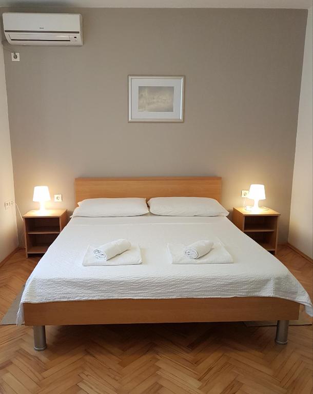 Postel nebo postele na pokoji v ubytování Guesthouse Jet
