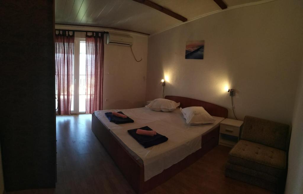 Posteľ alebo postele v izbe v ubytovaní Apartman Rodić