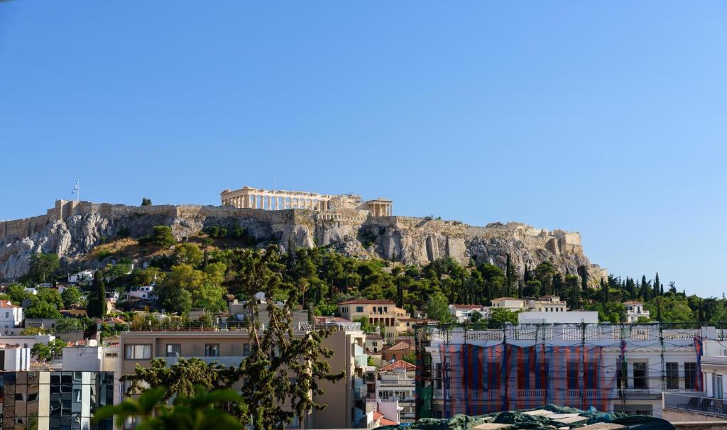 a view of the acropolis of athens from the city at Acropolis Eye Loft in Athens