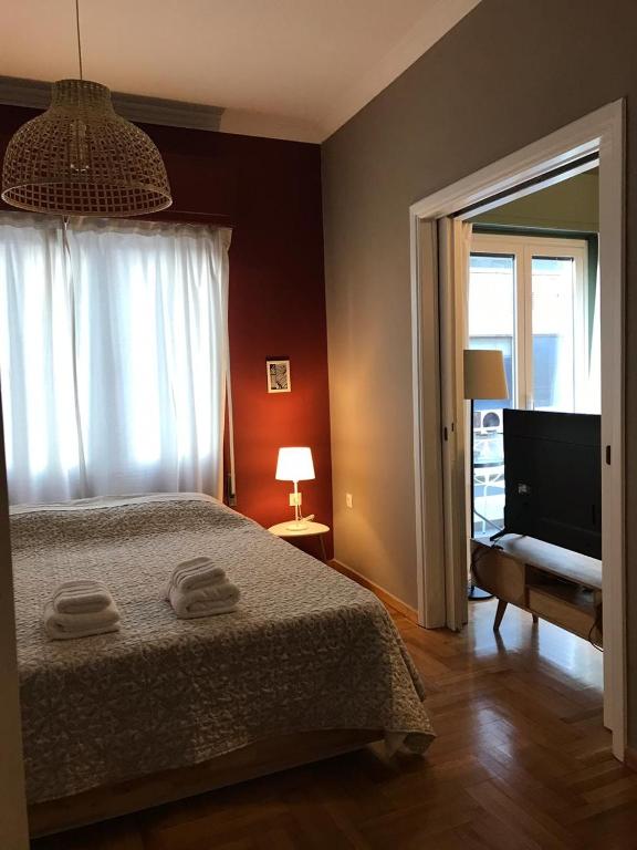Posteľ alebo postele v izbe v ubytovaní Kanigos 3 BR VIEW Center of Athens