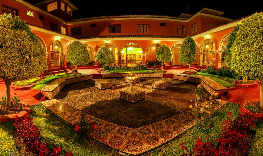 an aerial view of a courtyard at night at DM Hoteles Ayacucho in Ayacucho