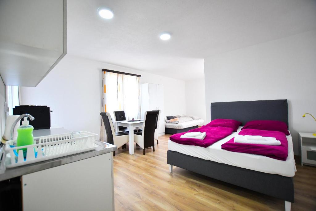 Postel nebo postele na pokoji v ubytování Vulsa Apartmani