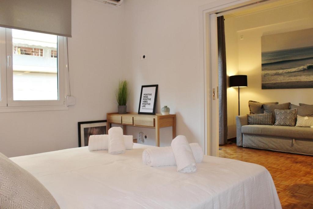Posteľ alebo postele v izbe v ubytovaní Athenian Hub Luxe Loft