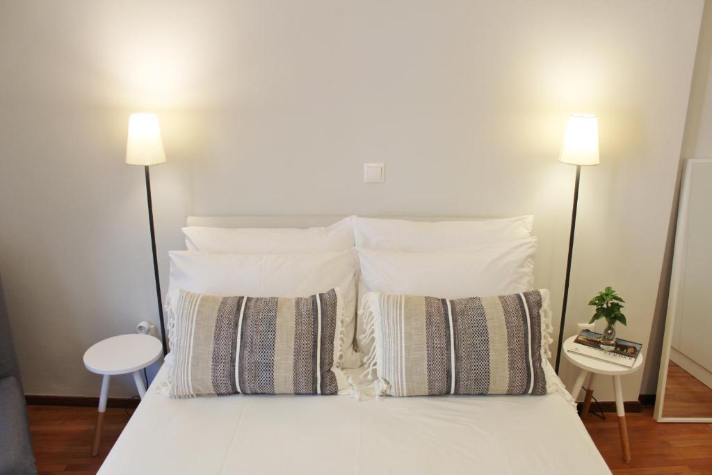 Posteľ alebo postele v izbe v ubytovaní Athenian Hub Luxe Loft