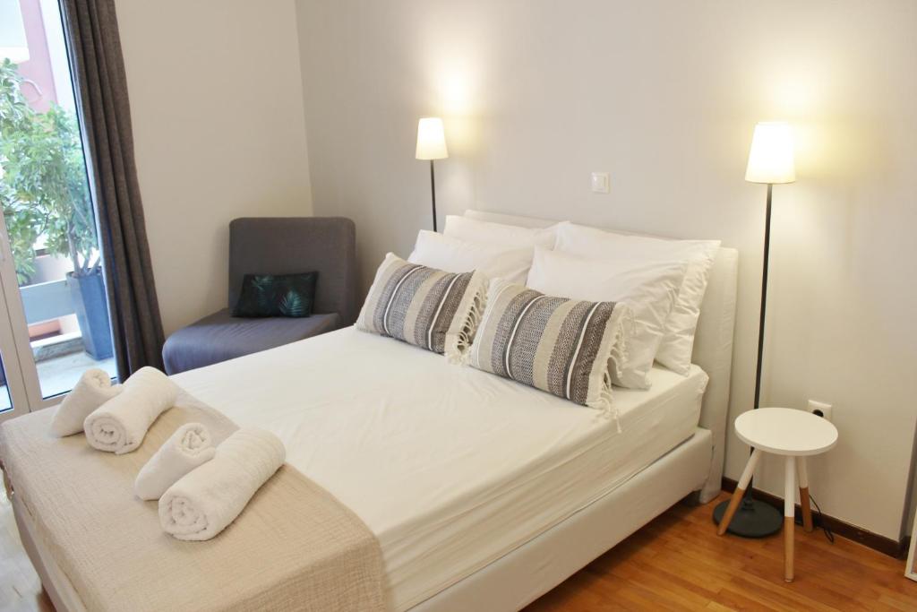 Posteľ alebo postele v izbe v ubytovaní Athenian Hub Luxe Loft