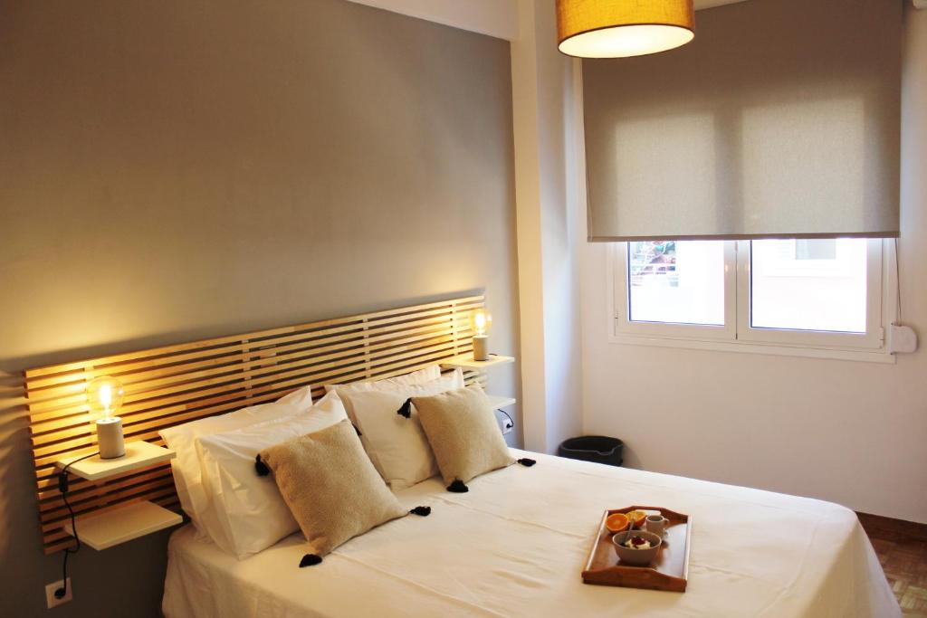 Posteľ alebo postele v izbe v ubytovaní Athenian Hub Luxe Loft