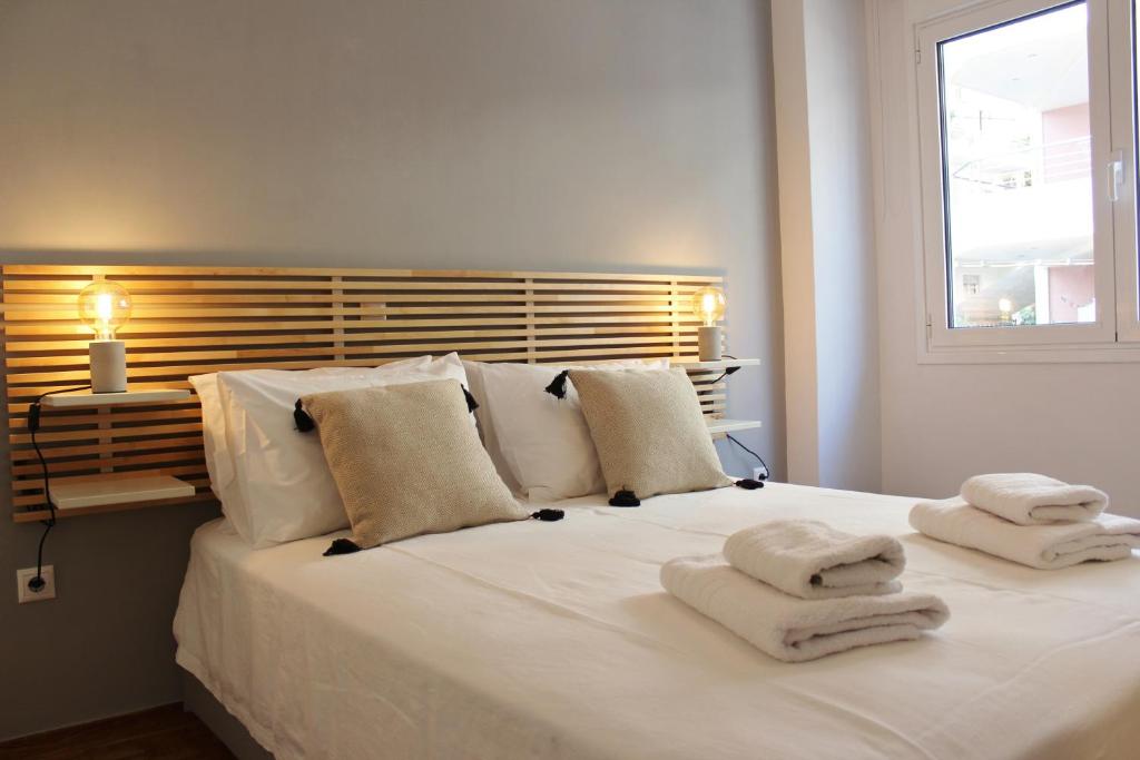 Posteľ alebo postele v izbe v ubytovaní Athenian Hub Luxe Loft