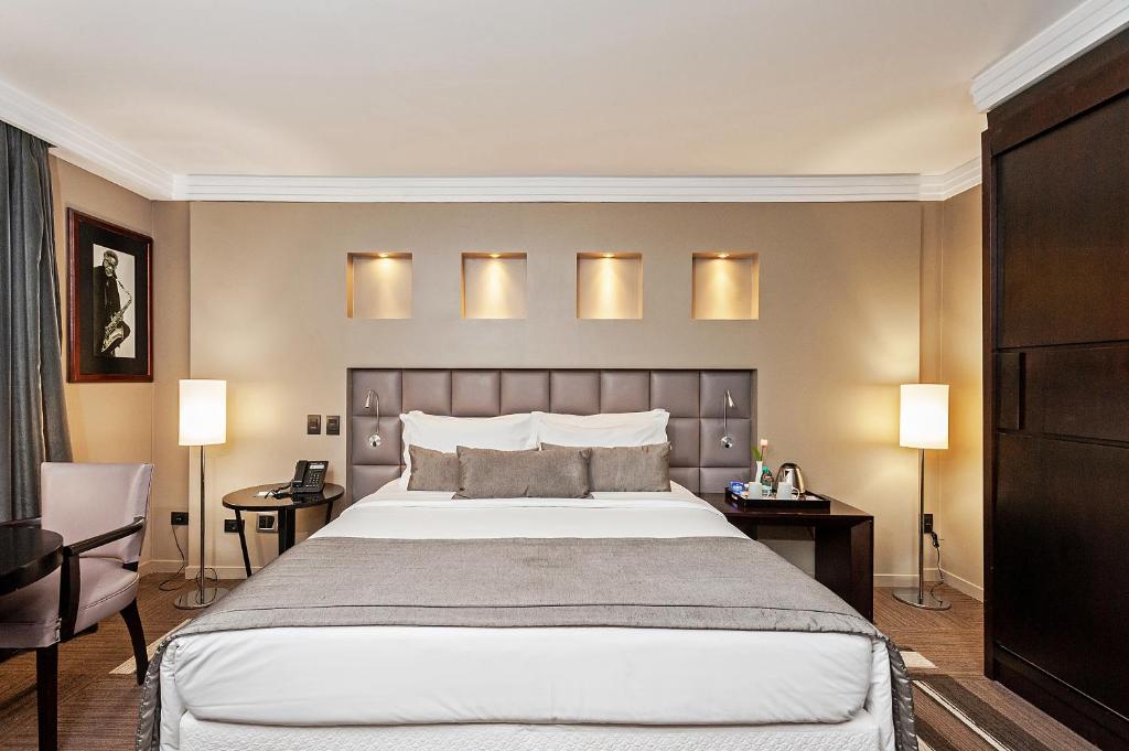 Postel nebo postele na pokoji v ubytování FULL JAZZ by Slaviero Hotéis