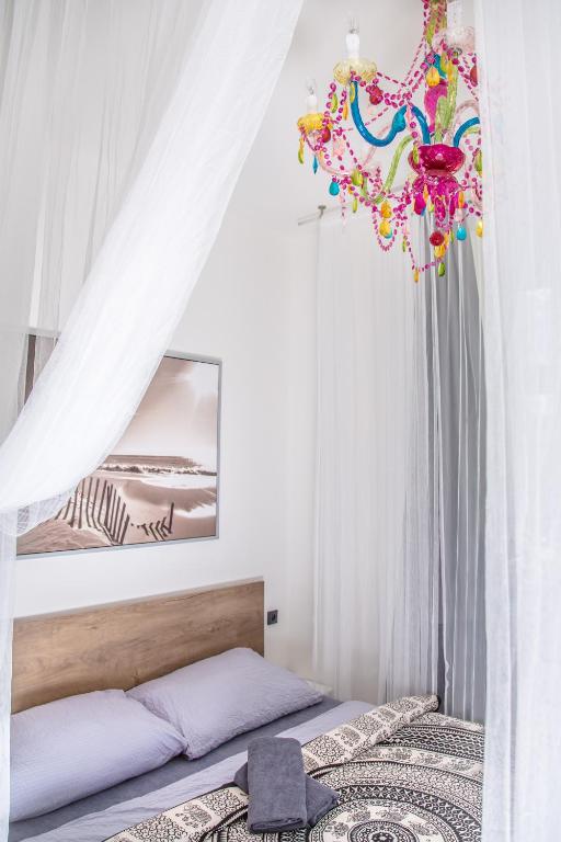 Letto o letti in una camera di Wake Up Wellness Hostel