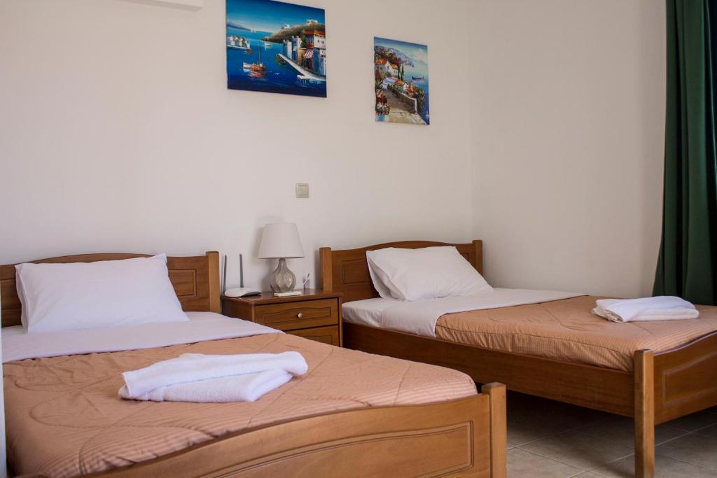 Postel nebo postele na pokoji v ubytování Sun & Sea