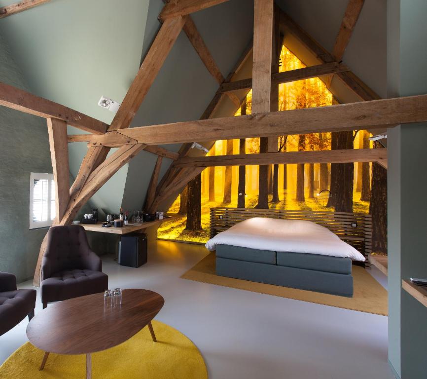 Postel nebo postele na pokoji v ubytování B&B La Suite
