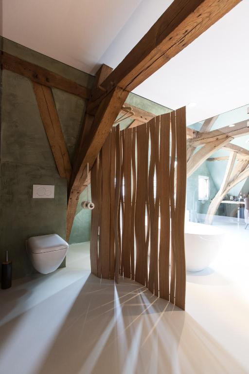 Postel nebo postele na pokoji v ubytování B&B La Suite