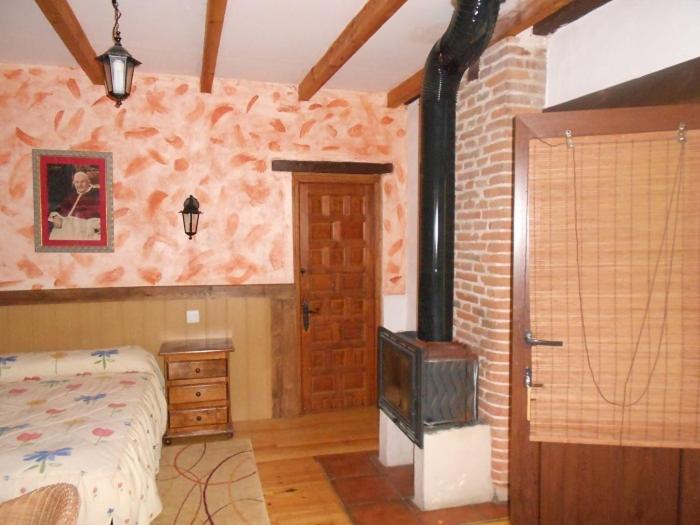 Postel nebo postele na pokoji v ubytování La Mesnadita