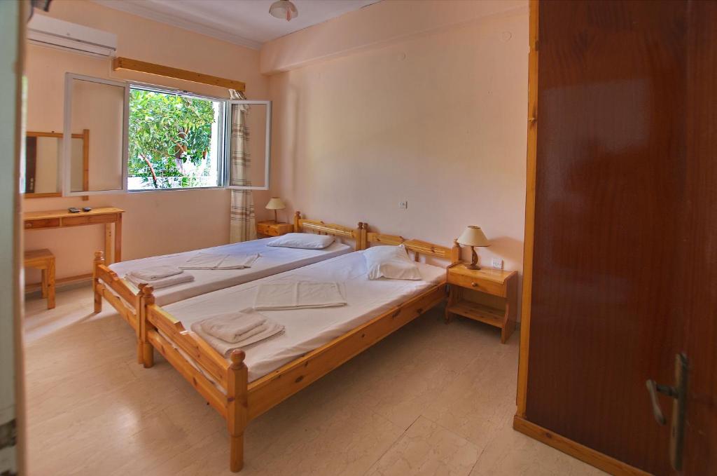 Postel nebo postele na pokoji v ubytování Villa Rebecca