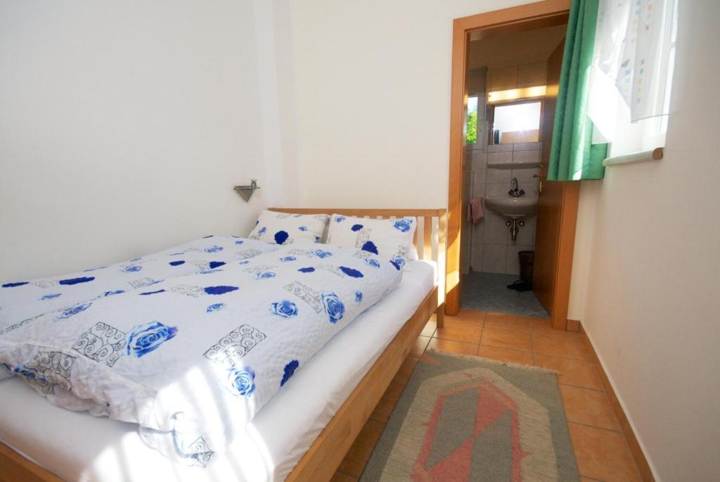Postel nebo postele na pokoji v ubytování Pension Regia
