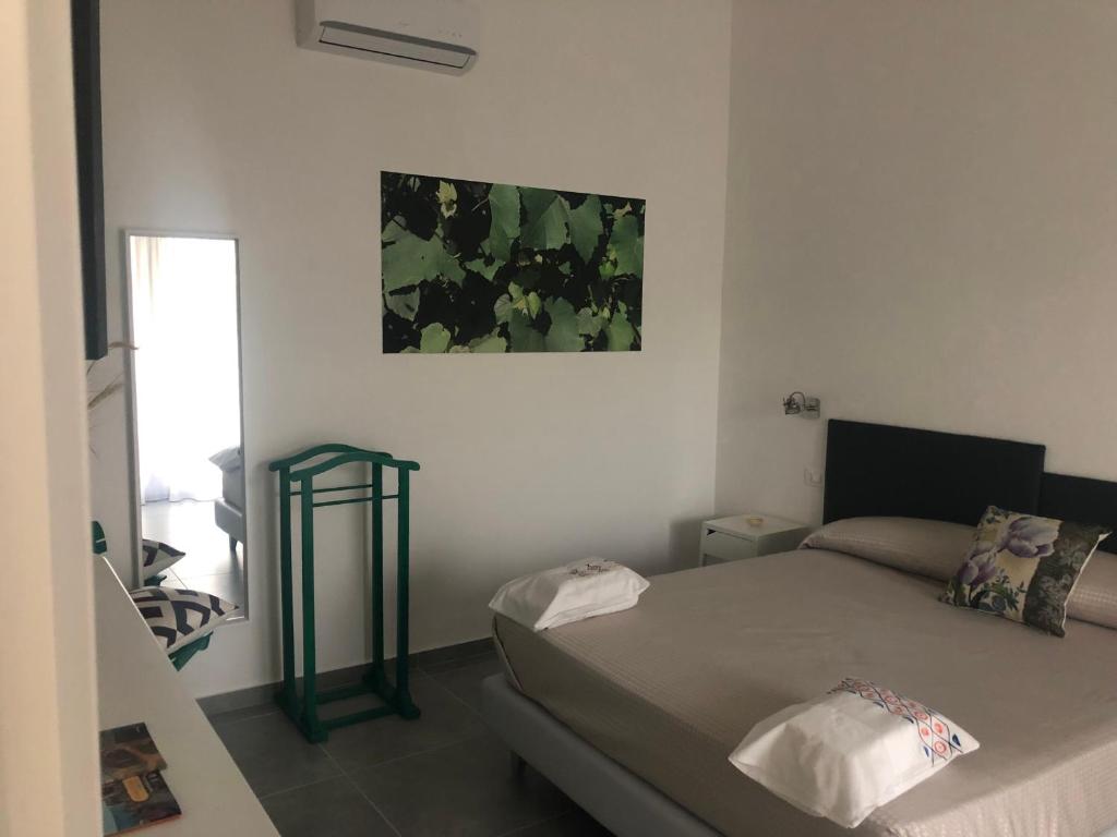 Postel nebo postele na pokoji v ubytování Il Platano Residenza Rurale