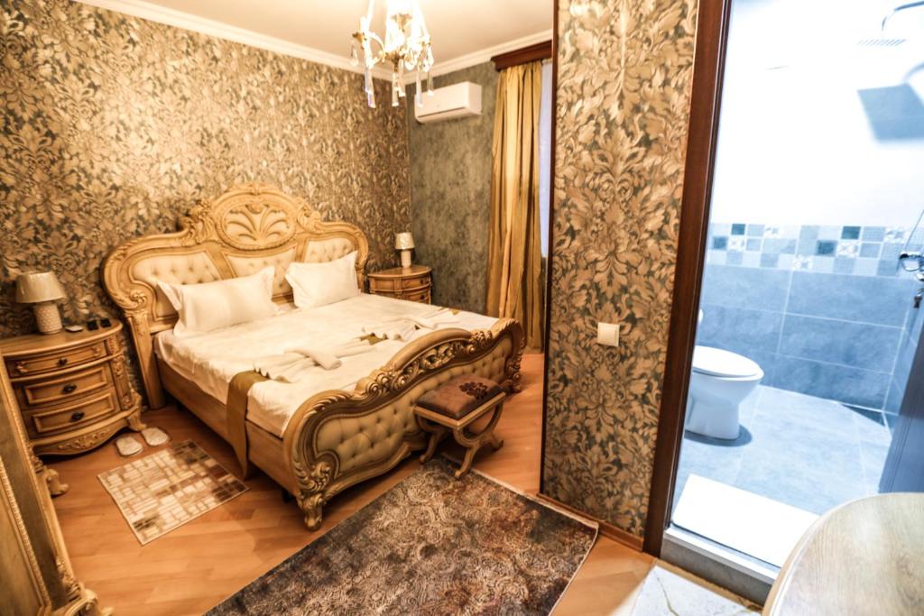 Postel nebo postele na pokoji v ubytování Hotel S.R