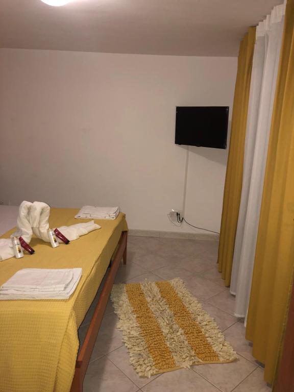 A bed or beds in a room at Ester