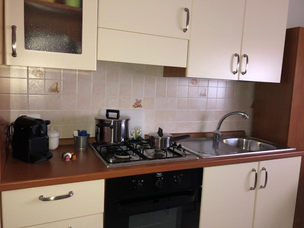 A kitchen or kitchenette at Ester