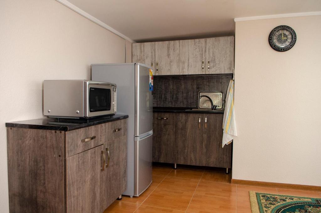 Kuchyň nebo kuchyňský kout v ubytování Hotel S.R