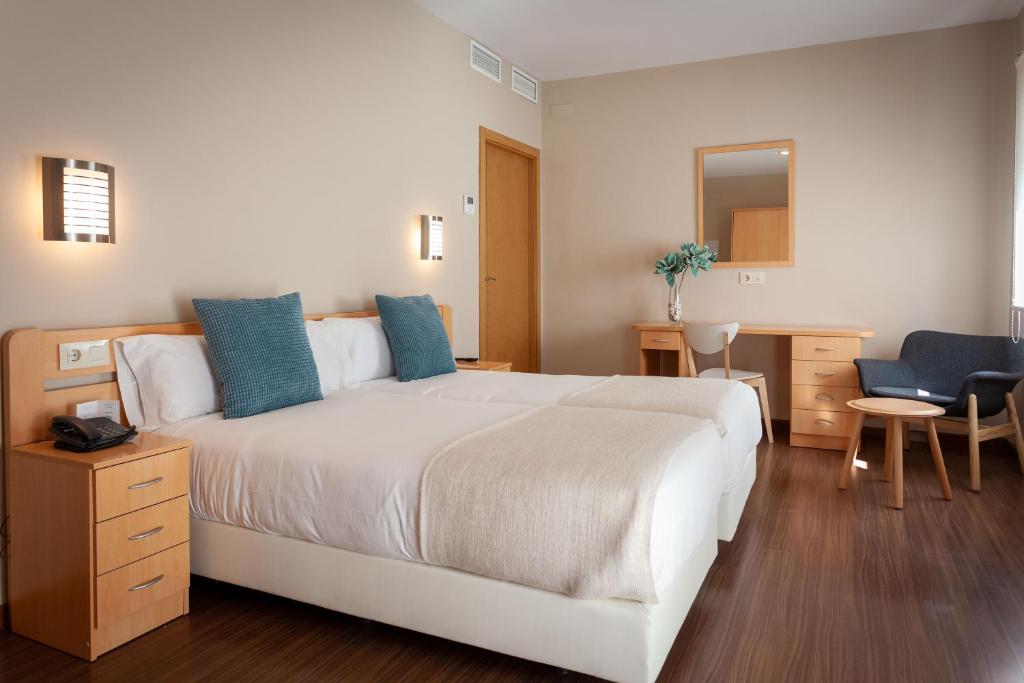 Krevet ili kreveti u jedinici u objektu Vettonia Hotel