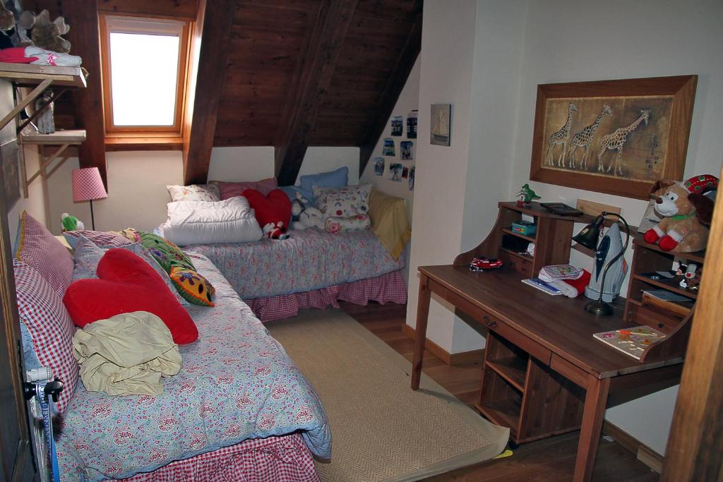 Postel nebo postele na pokoji v ubytování Salardu centro atico duplex NA