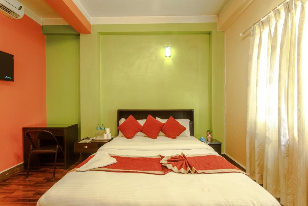 Postel nebo postele na pokoji v ubytování Hotel Nepalaya