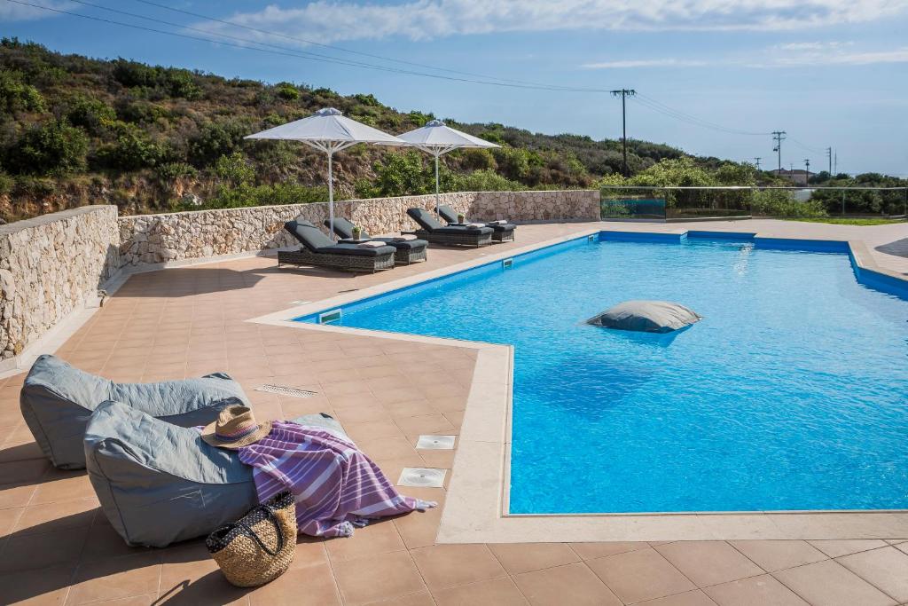 Bazén v ubytovaní Brand New Skala Beach Apartment- Pieno Di Luce alebo v jeho blízkosti