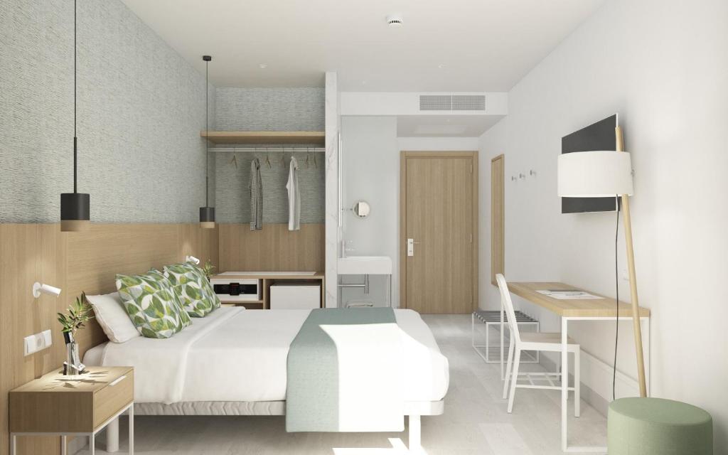 Postel nebo postele na pokoji v ubytování Hotel Seasun Aniram