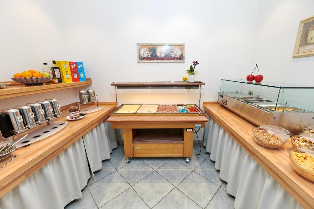 Kuchyň nebo kuchyňský kout v ubytování Hotel Rosemarie