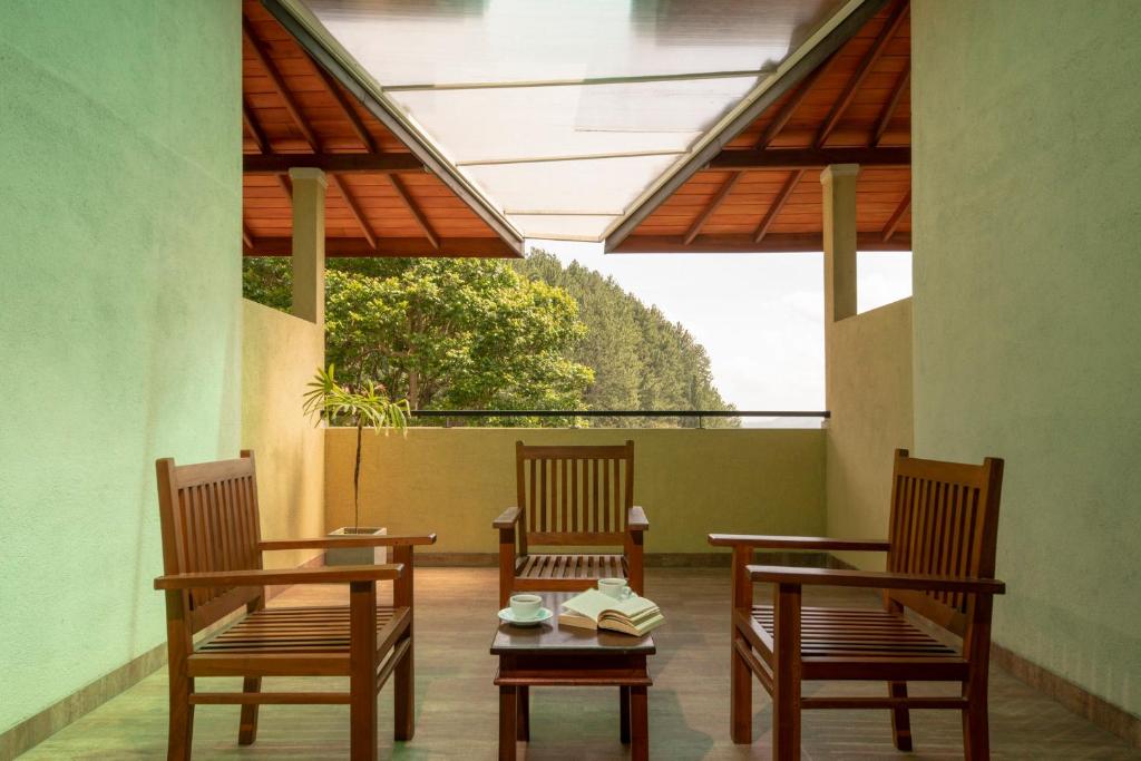 Posezení v ubytování Melheim Kandy Villas