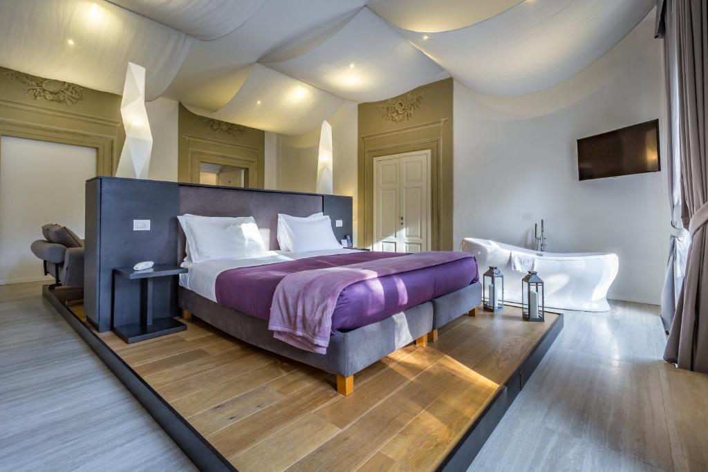 Postel nebo postele na pokoji v ubytování Hotel La Scaletta al Ponte Vecchio