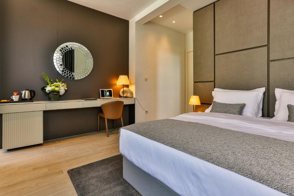 Posteľ alebo postele v izbe v ubytovaní Avanti Hotel & Spa